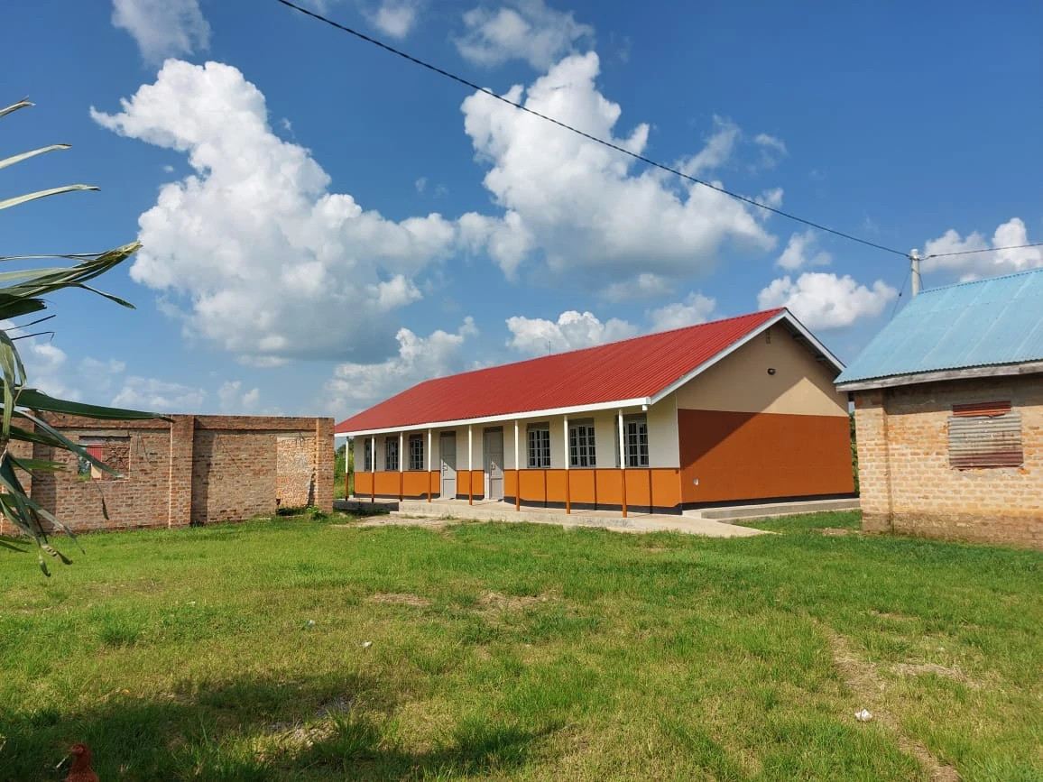 Building with a red roof and covered walkway